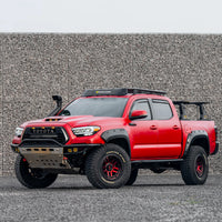 Third-generation Toyota Tacoma with the STORM roof rack, front three-quarter view — view 2