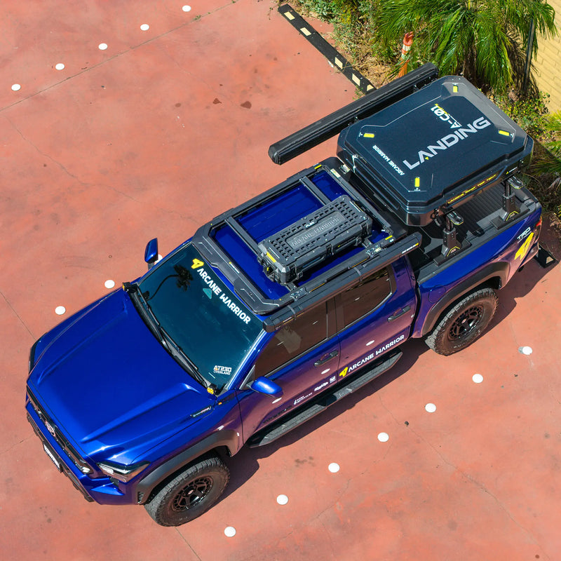 M'LinkX roof rack on a Toyota Tacoma cab roof, front aerial view