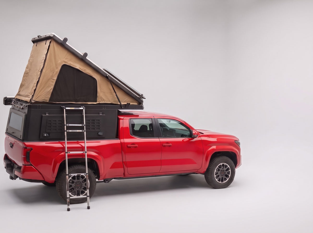 Step 2, main roof up: the roof tent open with the second hatch still closed, on a Toyota Tacoma