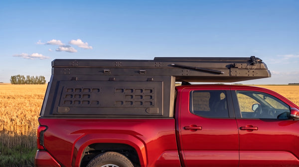 Locking side MOLLE panel on the aluminium truck cap camper