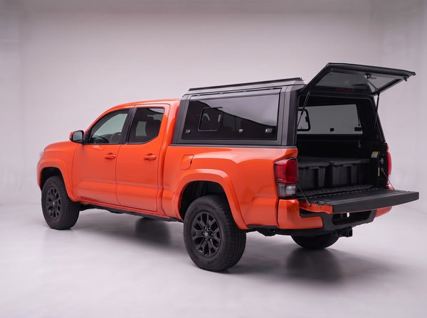 Full-width rear window door on the Toyota Tacoma truck cap