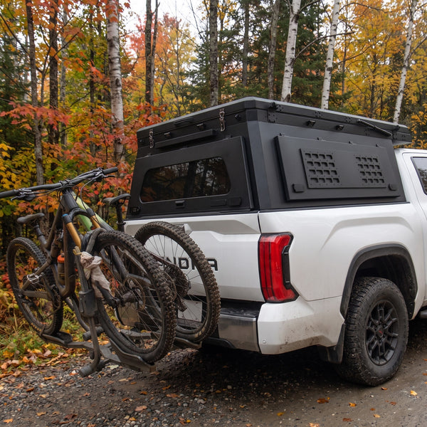 Locking side MOLLE panel on the aluminium truck cap camper