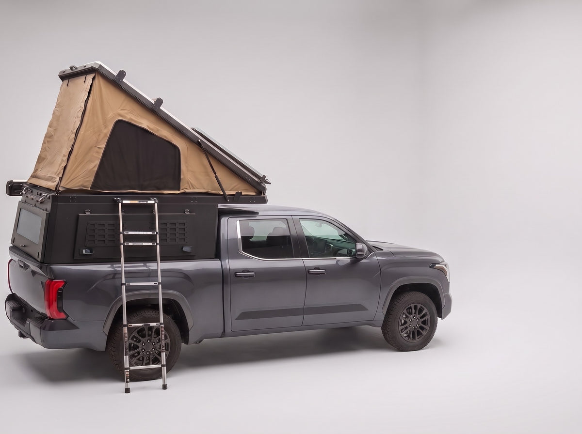 Step 2, main roof up: the roof tent open with the second hatch still closed, on a Toyota Tundra